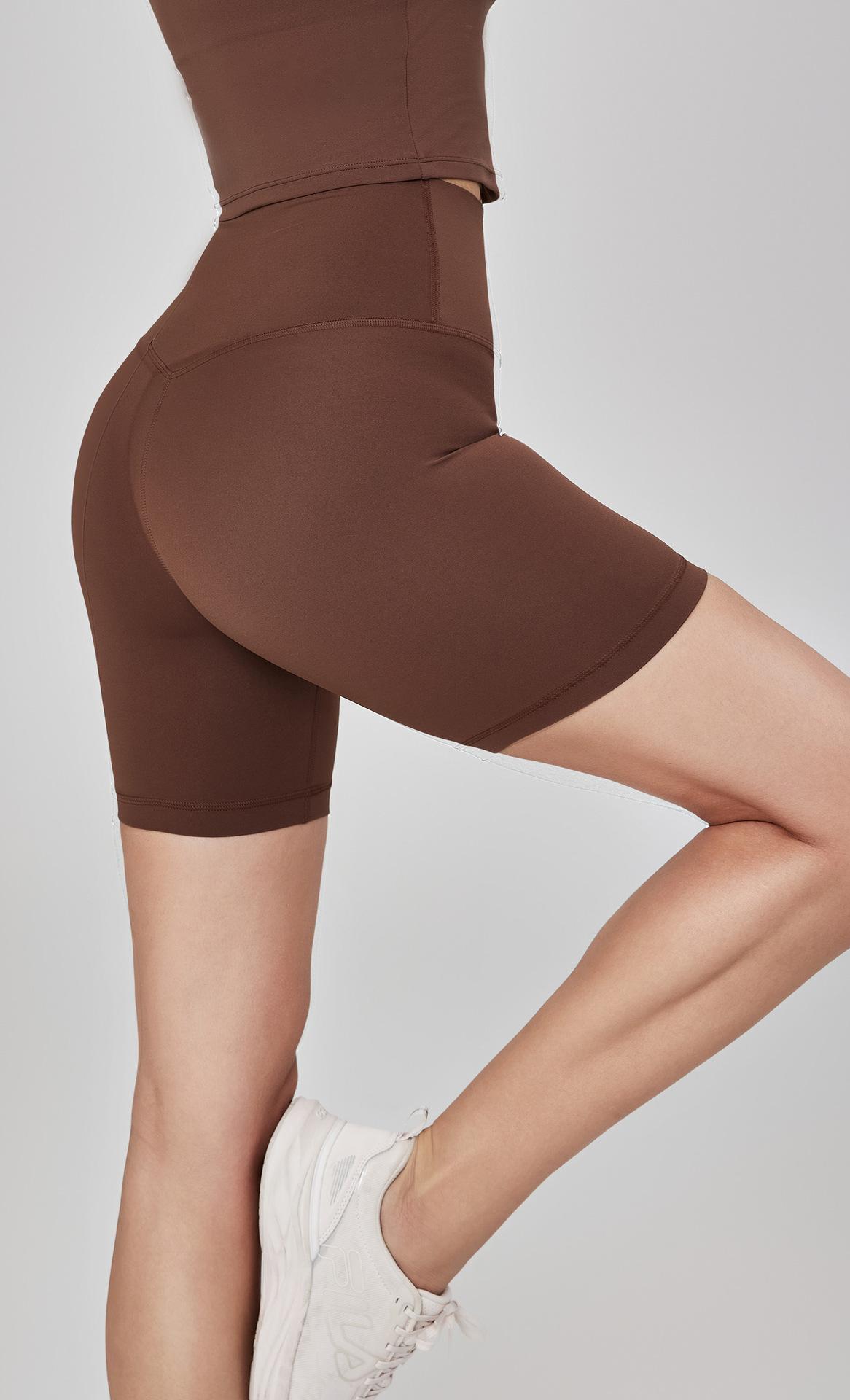 Spring and summer nude-feel running sports shorts for women, high-waisted, tummy-tightening, butt-lifting, three-quarter length pants for fitness, outdoor cycling, and yoga