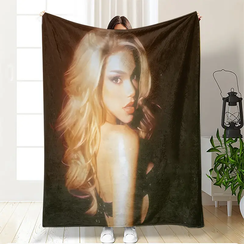 A high-resolution poster featuring Mexican singer-songwriter Kenia Os adds a touch of vibrancy to bedrooms and living rooms.Soft and comfortable, it's perfect for office naps, camping, and picnics-lightweight and cozy.