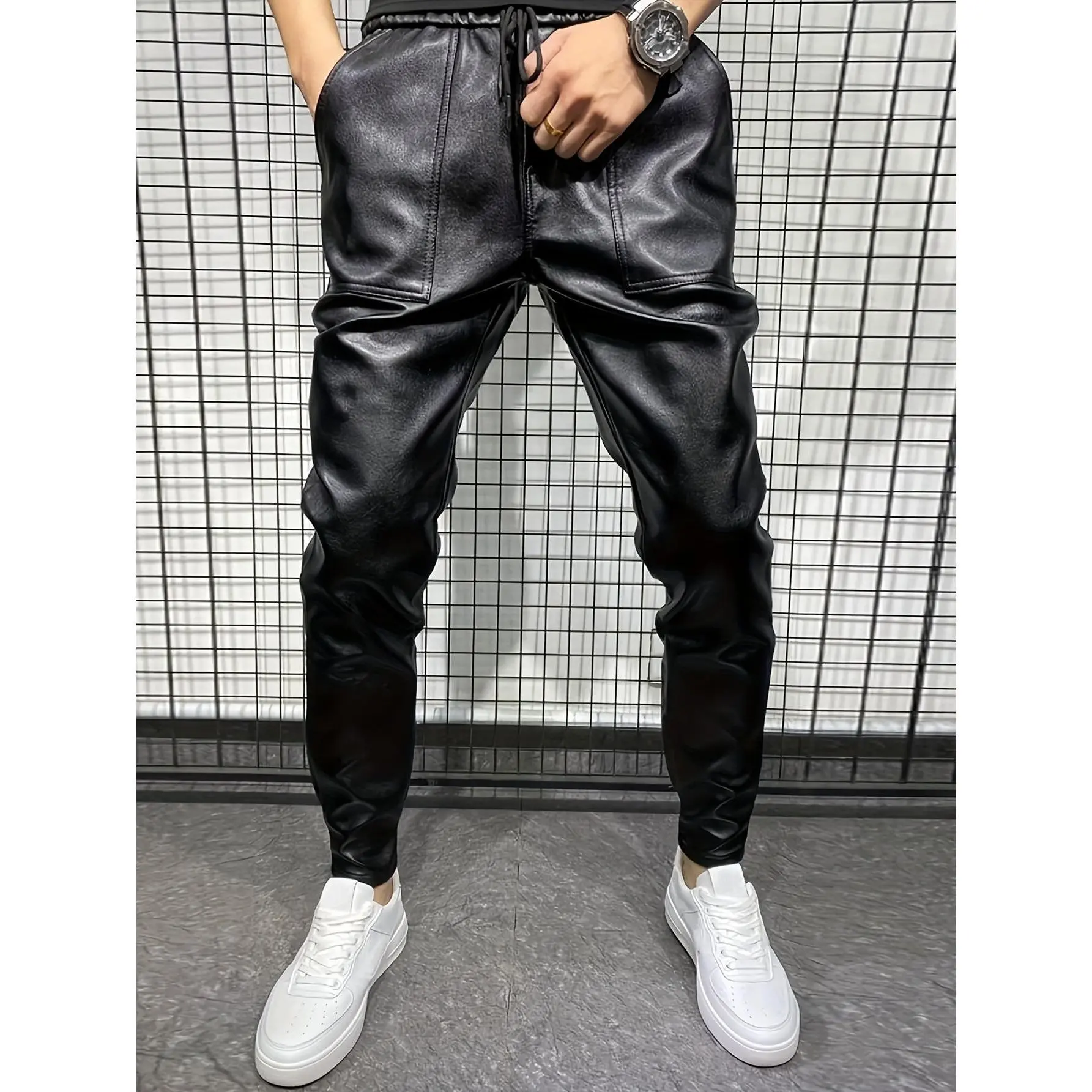 Premium high-cotton blend with a shiny finish, harem drop-crotch design, and ribbed ankle cuffs. Ideal for bold streetwear and casual fits.