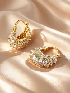 Luxury lightweight starburst heavy-cut diamond crescent ear cuffs with unique design, golden earring studs and hoops, perfect for elegant women's evening wear.
