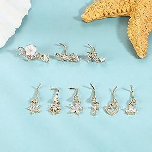 Trendy Summer 9 PCS Dangle Nose Rings - L Shaped for Women, 20G Stainless Steel Nose Rings Studs with CZ Cross, Crown, Flower, Heart Dangling Piercing Jewelry