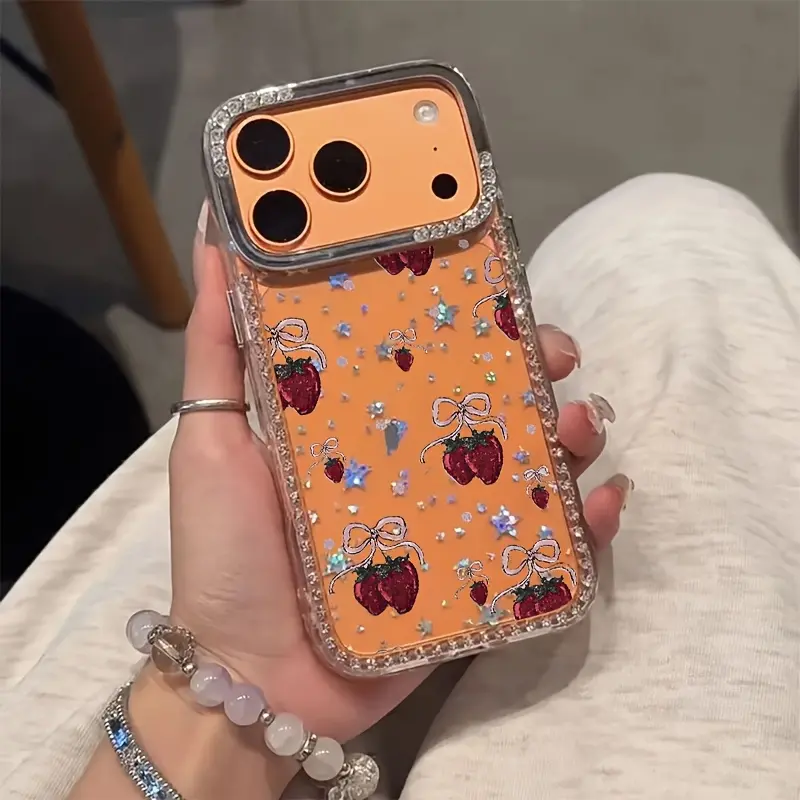 Phone Case: Phone Case- A Luxurious Phone Case Featuring an Oil Painting of Strawberries And a Bow, Adorned with Transparent Sparkling Diamonds And a Starry Border, Designed to Be Shockproof. It Is Compatible with iPhone 17 Pro Max, 17 Air, 16