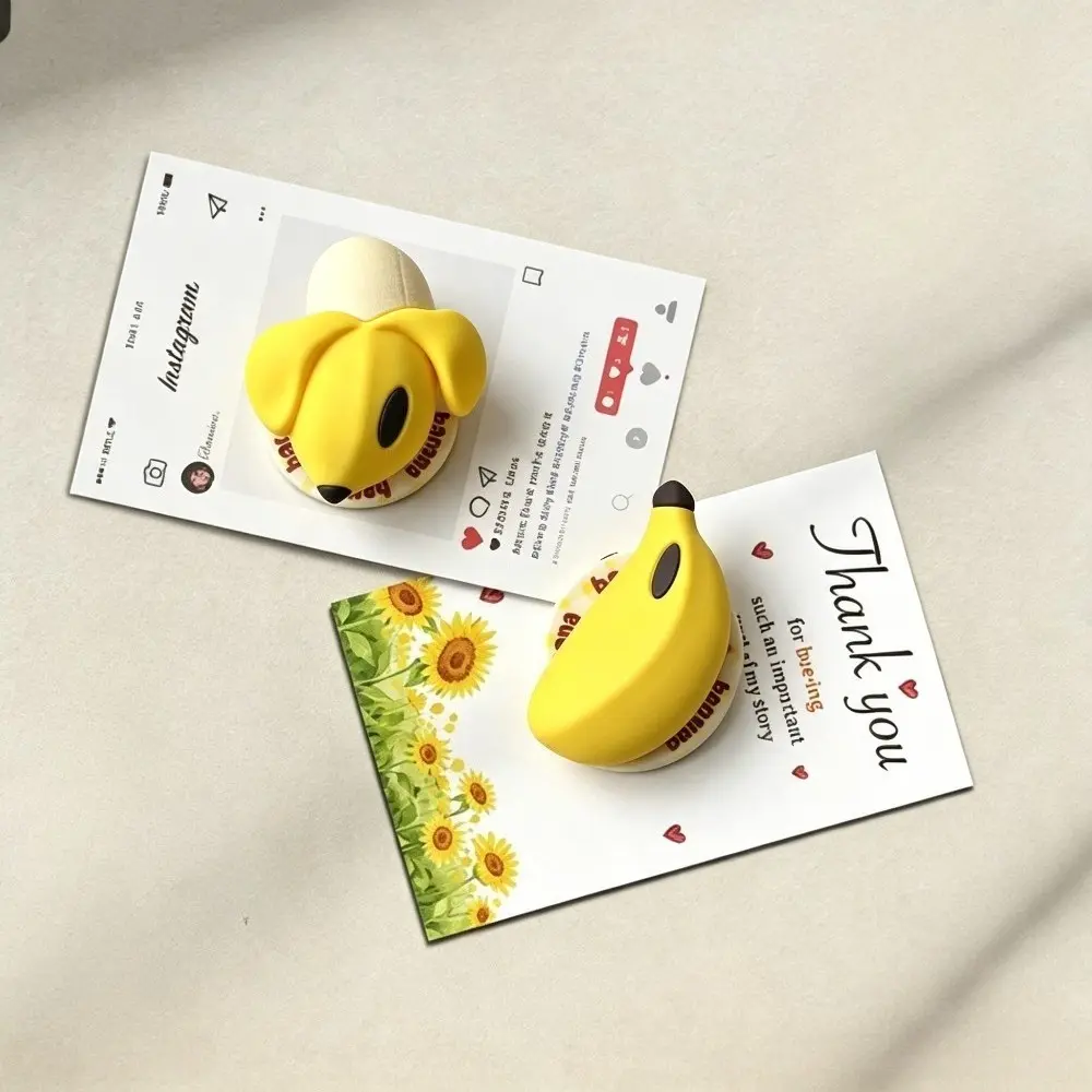 3D banana pop-up phone stand, cute cartoon silicone retractable phone grip, drop-proof desktop phone stand, high-value phone accessory.