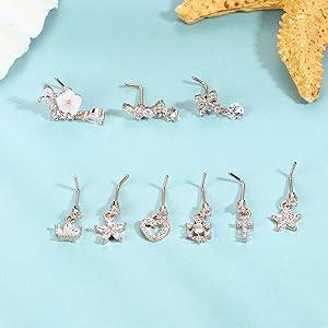 Trendy Summer 9 PCS Dangle Nose Rings - L Shaped for Women, 20G Stainless Steel Nose Rings Studs with CZ Cross, Crown, Flower, Heart Dangling Piercing Jewelry