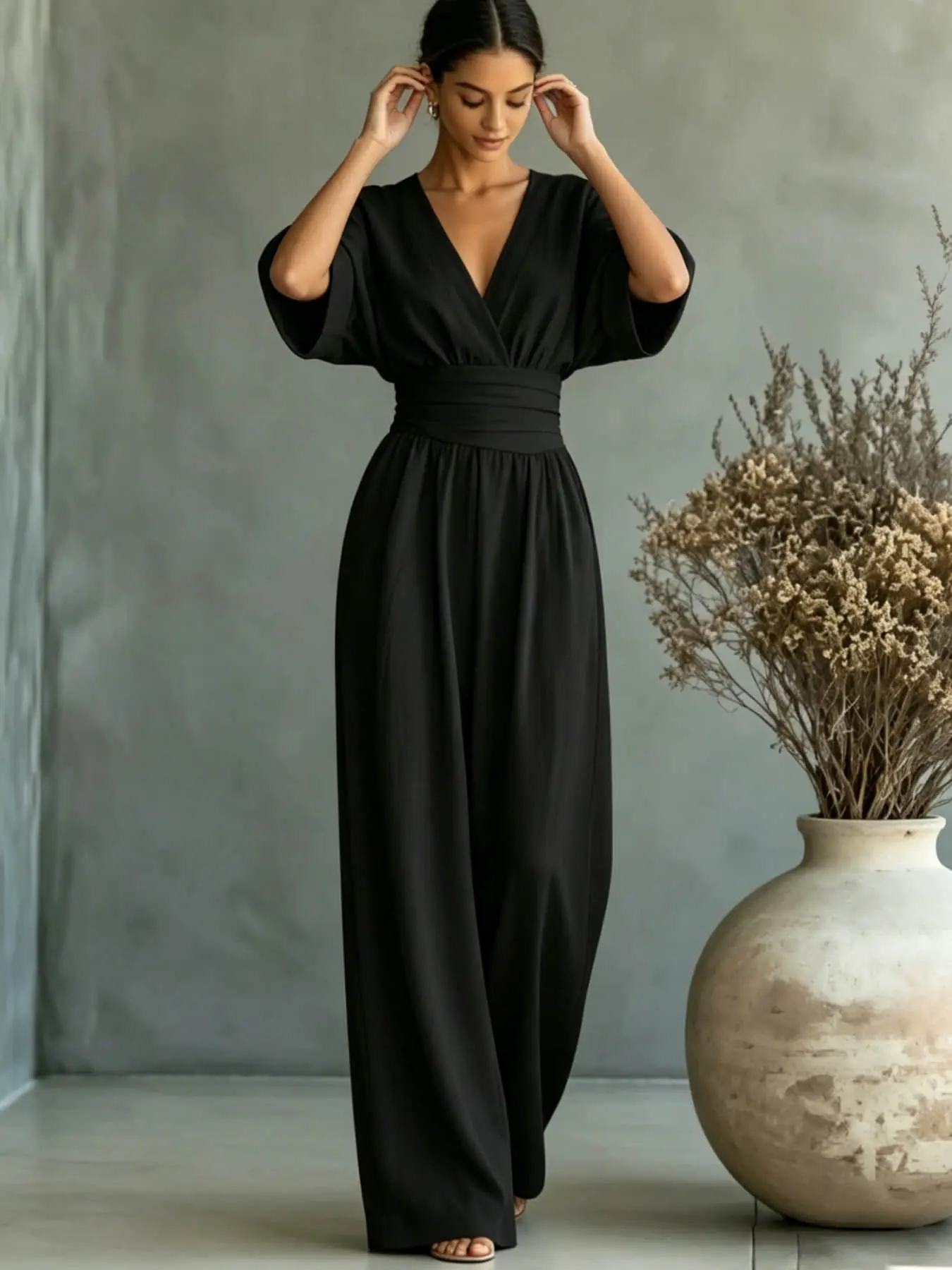 Summer new fashionable and high-end V-neck one-piece wide leg pants with cinched waist for slimming effect. Bubble sleeve design is suitable for daily travel, outdoor lawn banquets, light wedding outfits, afternoon tea, commuting Wide leg jumpsuit