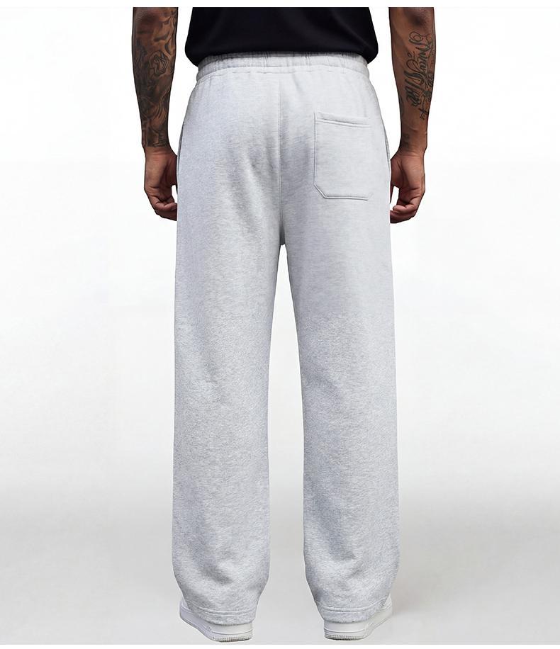 Black loose men's sweatpants, extremely comfortable for daily wear, skin-friendly men's jogging pants, super comfortable with elastic waistband, classic drawstring men's casual sweatpants, suitable for various occasions, and perfect for wearing in autumn