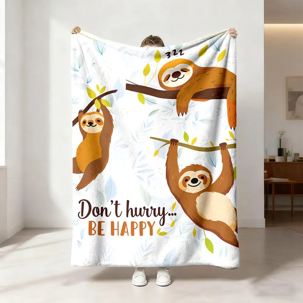 This flannel blanket with a cartoon sloth, branches, and green leaves pattern is soft, warm, and versatile, suitable for use as a sofa bed cover, an office nap blanket, an outdoor camping blanket, or a gift for all seasons.