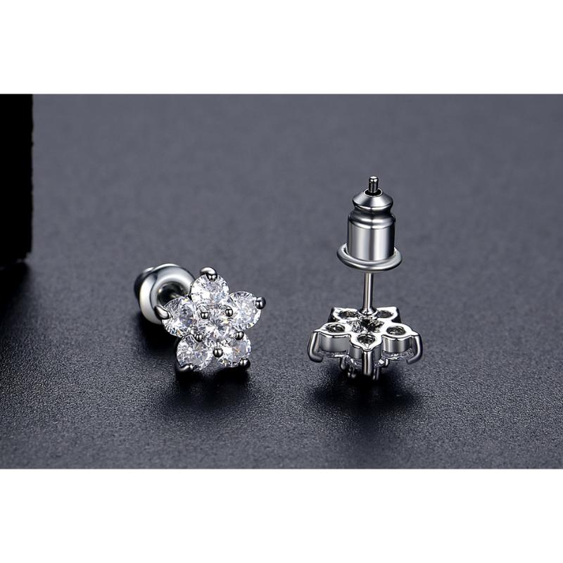 S925 Pure Silvery Moissanite Earrings in a Romantic Flower Design, Offering a Touch of Light Luxury And High-End Appeal. These Exquisite And Sweet Earrings Are Small And Perfect for Daily Wear Or Parties, Making Them an Ideal Gift for Women