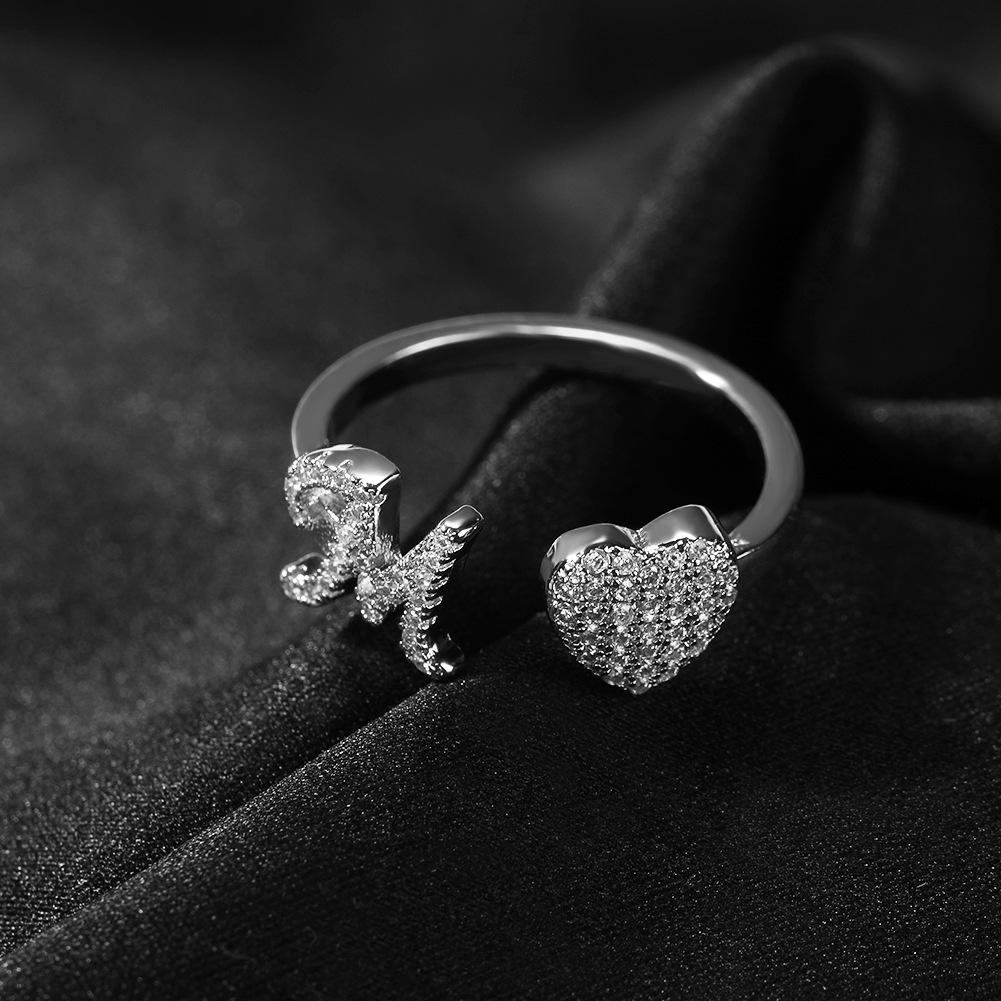 Minimalist and unique 26-letter English alphabet ring, adjustable opening, light luxury niche design, high-end heart-shaped ring
