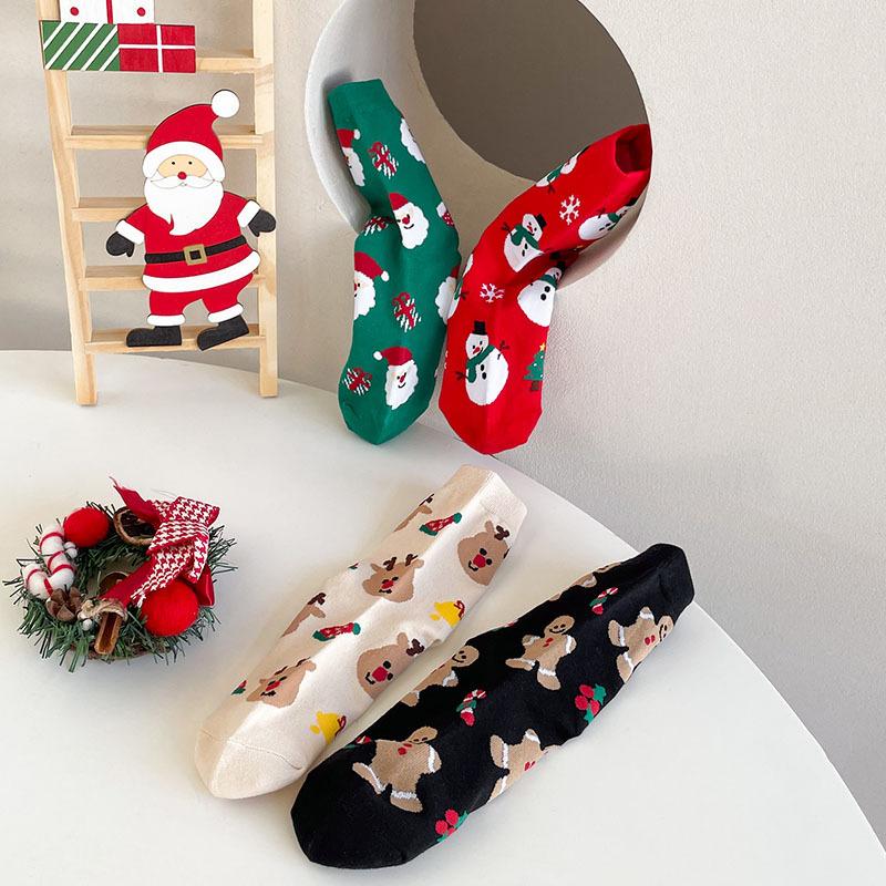 4pack Christmas stockings - Men's and women's mid-calf socks with cute cartoon designs, trendy long socks for Instagram.