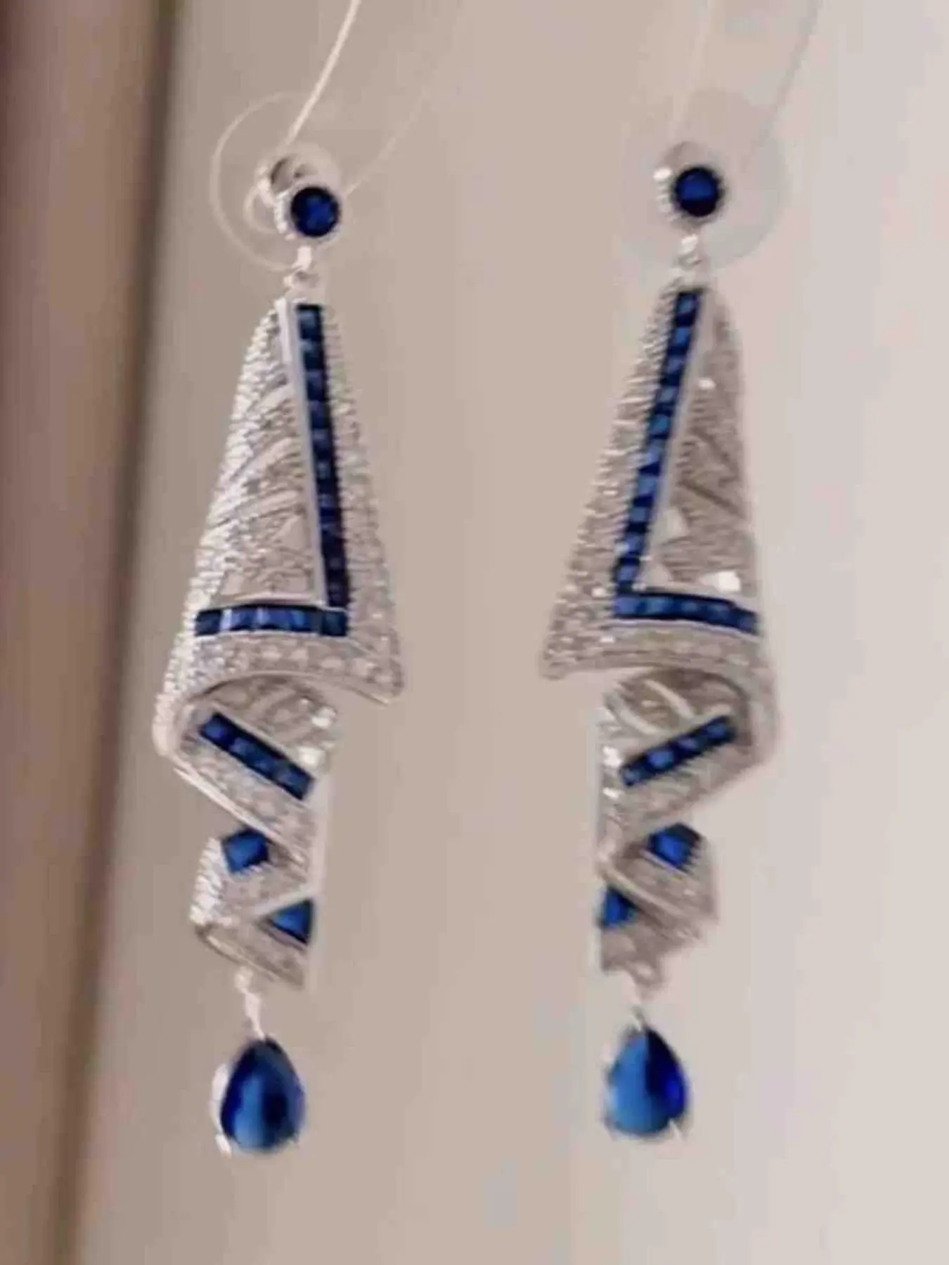 Luxurious and shiny white and blue crystal embellished delicate ribbon design long wedding bride earrings for women, elegant anniversary party evening jewelry, Valentine's Day and Mother's Day gifts, for parties, festivals, graduation season, travel.