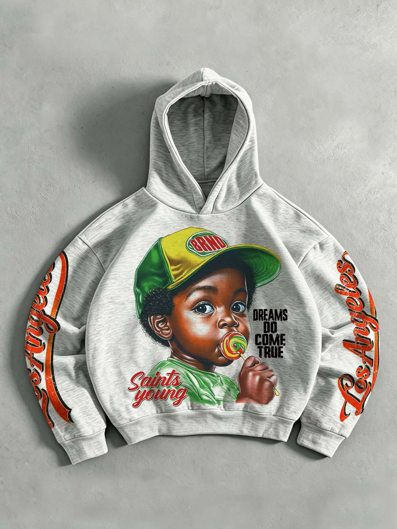 Retro California-style hoodie featuring a graphic print of a young boy with a lollipop; designed with an all-over distressed "Los Angeles" text print on the sleeves. A loose-fitting, casual, and versatile unisex hoodie suitable for couples.
