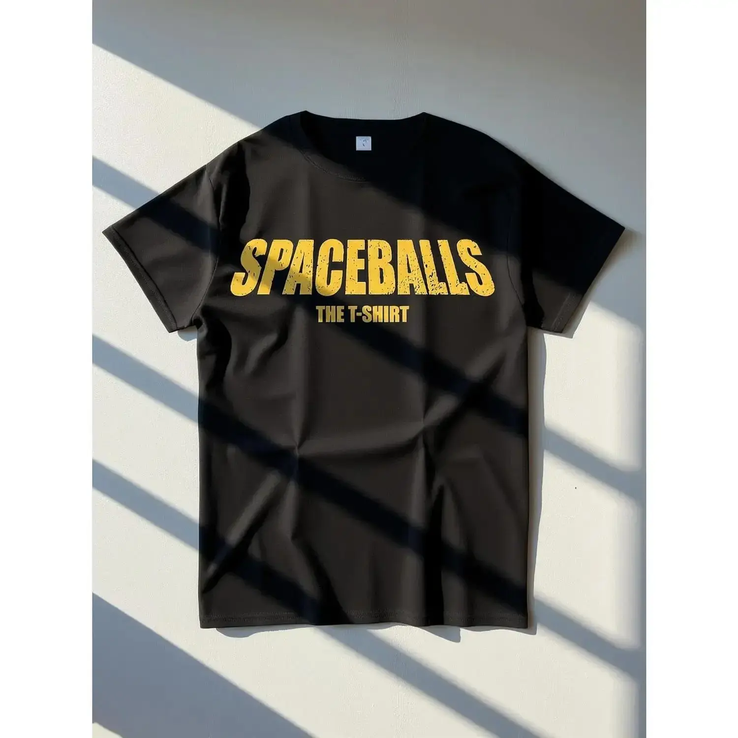 Retro-style *Spaceballs* movie T-shirt—a classic sci-fi comedy fan tee featuring a comfortable crew neck and short sleeves; a unisex design suitable for casual everyday wear, an ideal gift for movie buffs, and a stylish shirt that grandmothers love too.