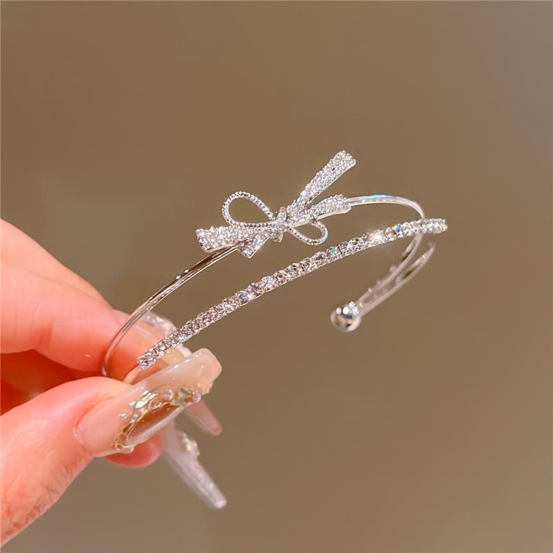 Elegant Gold Bow Bracelet with Synthetic Cubic Zirconia Inlay, Women's Open Design Bracelet for Casual and Special Occasions