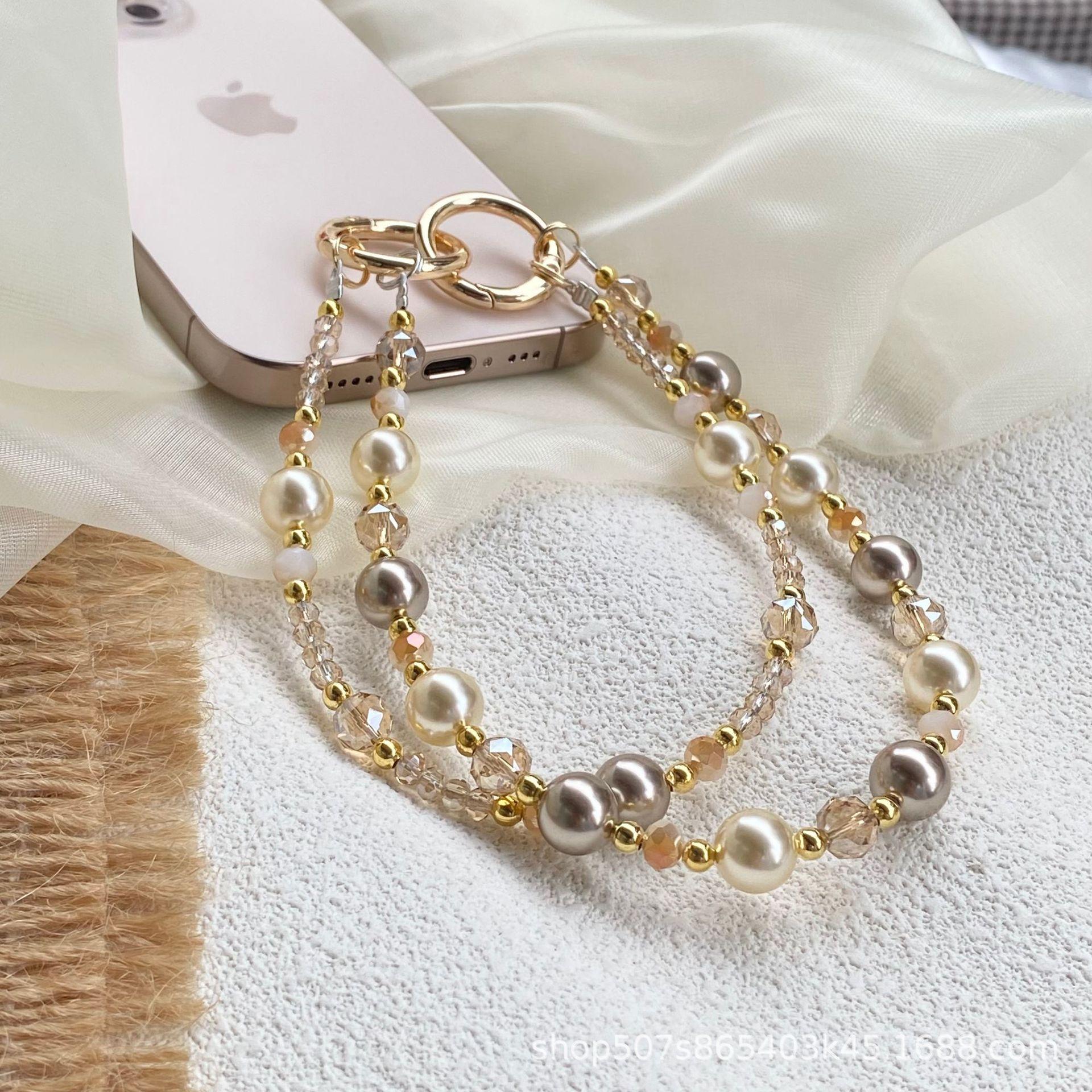 Amber gold foil bead crystal double-chain phone strap, high-end anti-loss pendant chain, luxurious style keychain phone strap