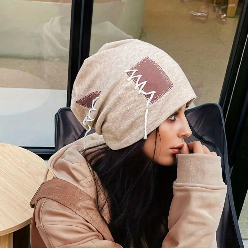 Solid Tone Brimless Knit Beanie Decorated With Textured Rope Detail Fluffy Pom Pom Ornament Soft Stretchy Yarn Relaxed Comfort Silhouette For Women Daily Travel Festival Leisure Minimalist Fashion Headwear