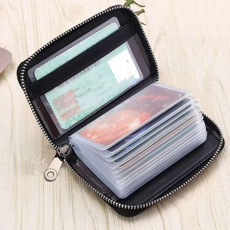 1 Pc, Men's Ultra-Thin RFID Anti-Theft Zipper Wallet，Multi-functional card holder with secure travel document storage. Accommodates 22+ cards and cash. Durable black design with minimalist style and a metal clasp charm.