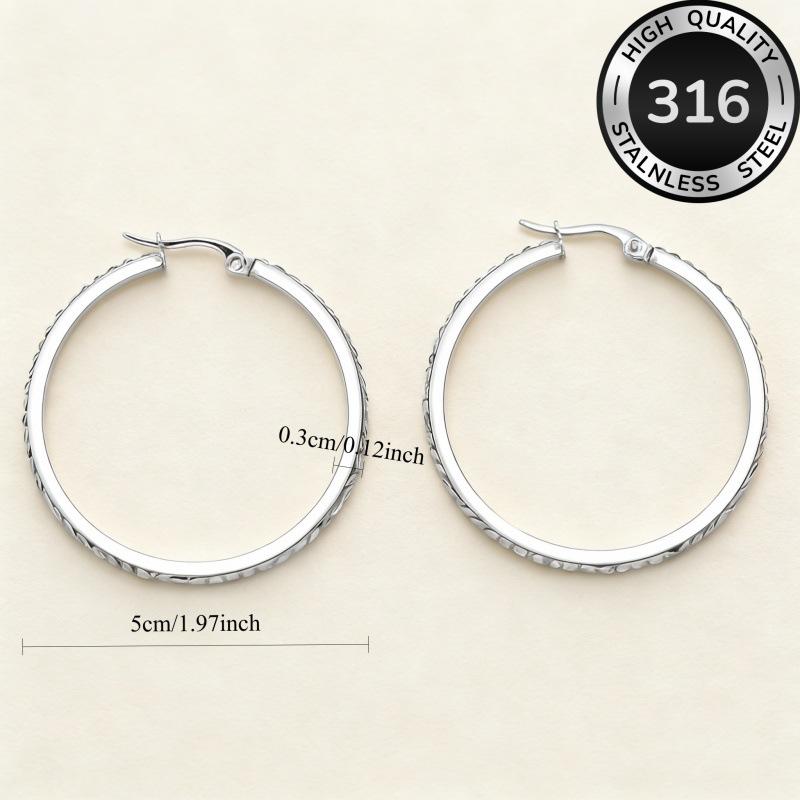 Round stainless steel diamond-encrusted earrings, a fashionable and light luxury accessory for women with large circular stud earrings