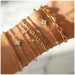 Main Character Energy 8 Pcs Chunky Gold Bracelet Set with Cross Flower Crystal Stones Baddie Y2K Viral Effortless Glamour Mixed Chain Stack Statement Jewelry for Women Daily Wear