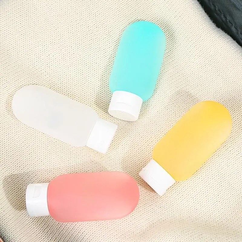 Travel Size Toiletry Bottles (4-PCS, 2 oz Each) - Refillable Liquid Containers for Shampoo, Conditioner, and Body Wash - Perfect Travel Set for Skincare and Haircare Products, Ideal for Business Trips and Vacations