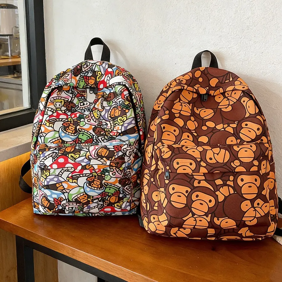 Cartoon monkey graffiti backpack student bag men's and women's versatile school bag casual fashion backpack trendy bag