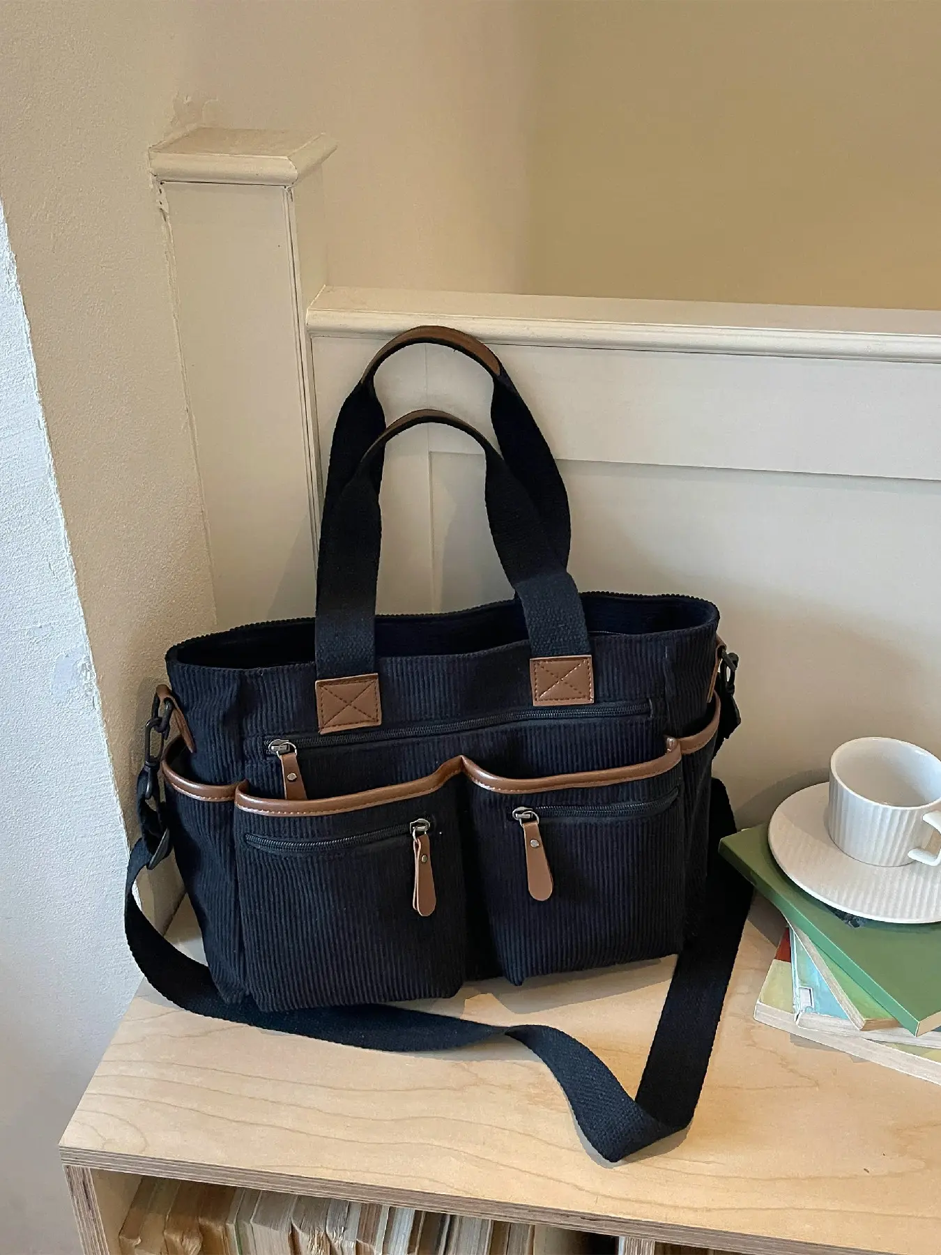 Casual and stylish large capacity multi pocket corduroy tote bag that can be carried by hand, shoulder or crossbody, suitable for daily outings