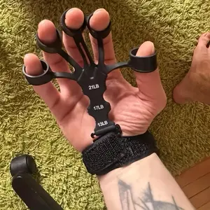 Five-Finger Strength Trainer - Adjustable Resistance, Specifically Designed to Enhance Hand, Finger, and Forearm Strength. An Ideal Choice for Athletes and Musicians to Improve Grip Strength and Flexibility!