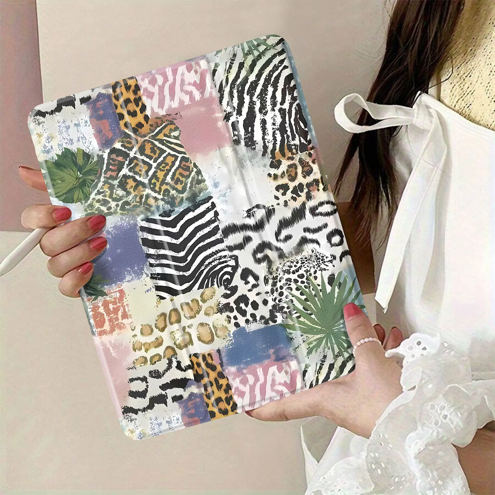 multicolor animal print fabric with vibrant patterns including leopard, zebra and tropical leaves ideal for sewing projects and home décor creates a lively and stylish atmosphere