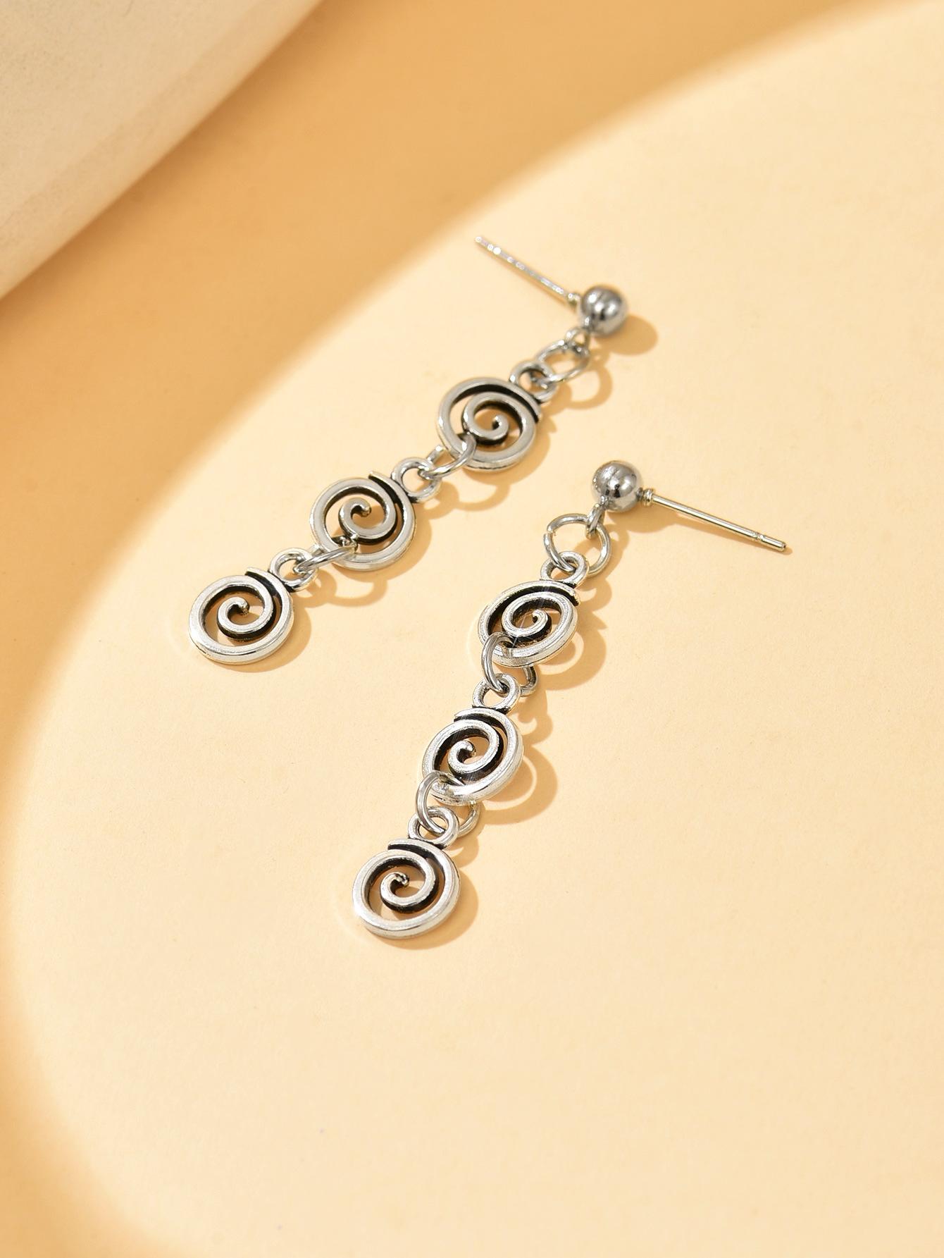 Vintage spiral earrings with distressed design, mosquito incense holder pendant, swirling long fringed earrings