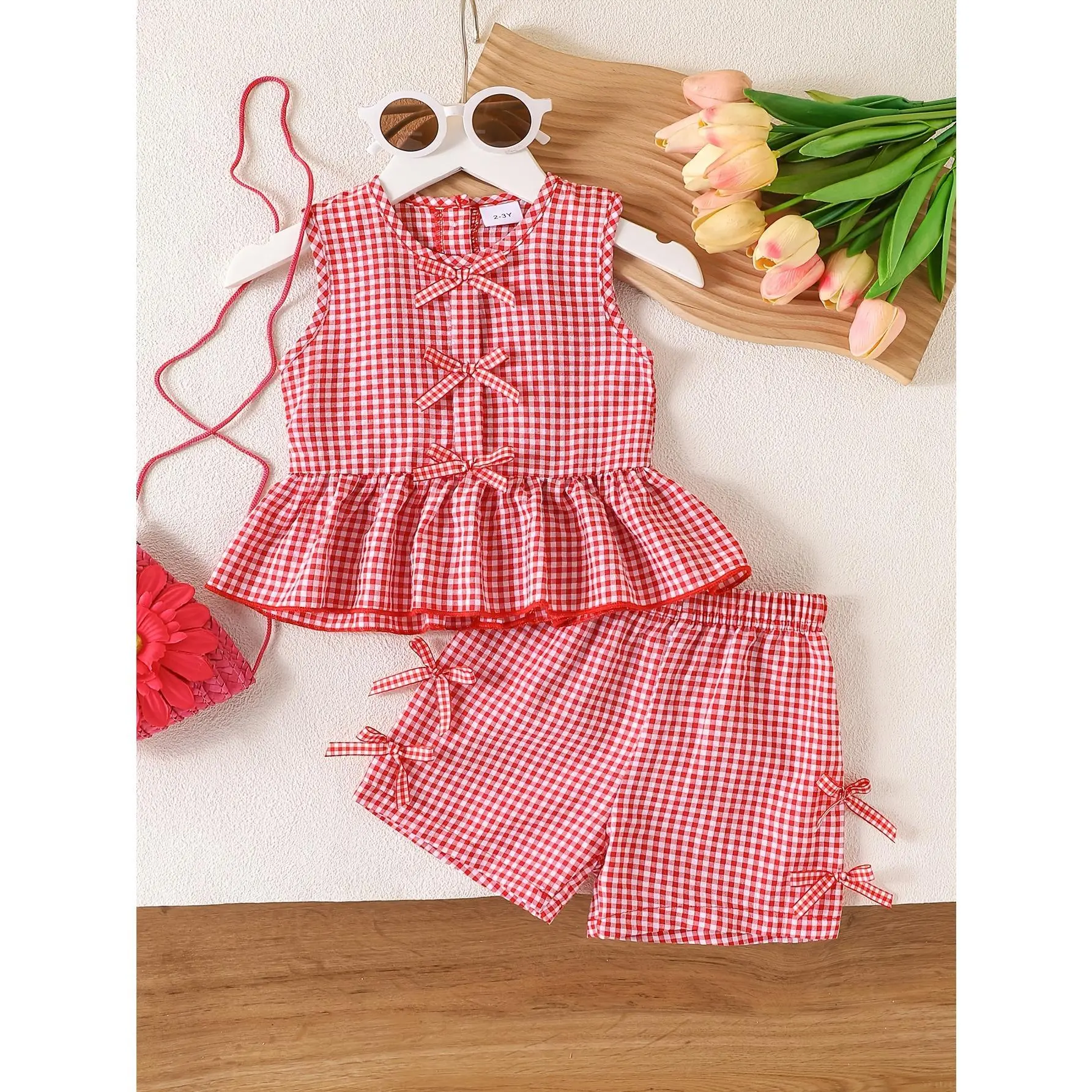 Girls Red & White Plaid Bow Sleeveless Top & Shorts 2-Piece Set - Retro Sweet Style with Eye-Catching Bow Decorations and Exquisite Plaid Pattern. Ideal for summer wear. Kids girls clothing, cute toddler outfits, perfect for daily street looks and outdoor