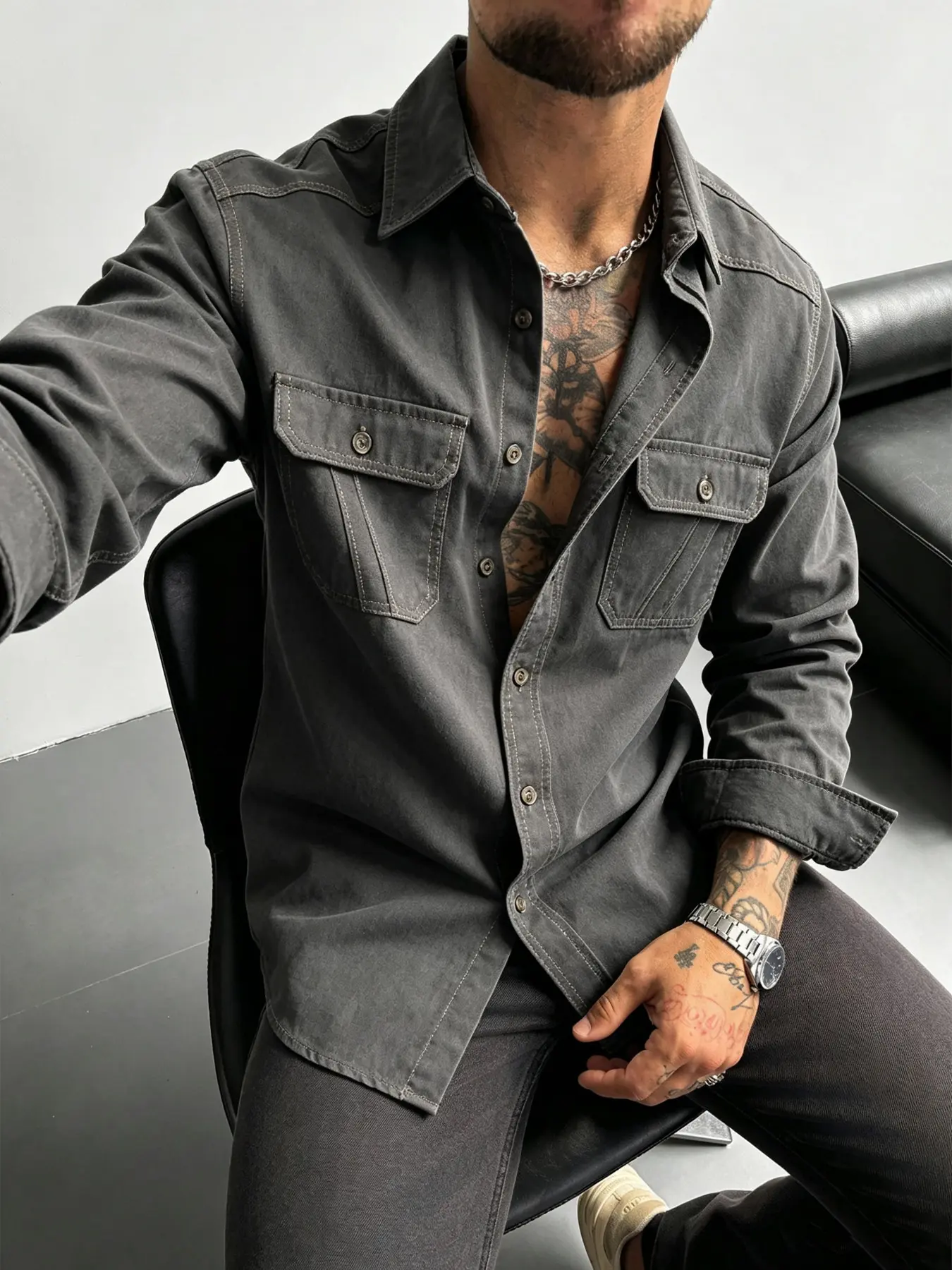 Men's pure cotton denim shirt featuring a distinctive wash finish; a high-quality, versatile staple perfect for a mature, everyday street-style look.