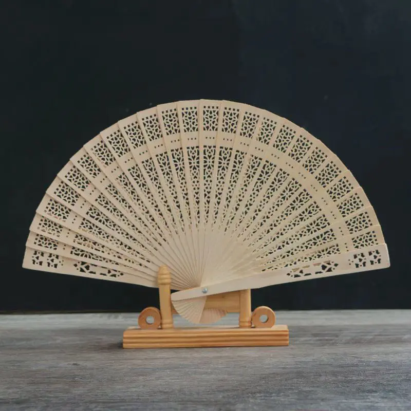 Hollowed-out wooden Chinese fan, sandalwood fan, gift fan