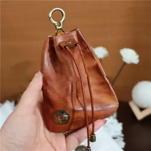 Mini size, MAXIMUM organization.  Sporran upgrade: coins, cards, AirPods – you name it. Perfect for travel or daily carry. Leather Clutch Adjustable Strap Purse