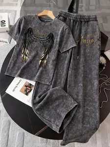 2-Piece Set: Distressed Casual Outfit Featuring a Tri-Color Black & Gold Wing Print (Y2K Sweet-Cool/Baddie Style) — Includes a Drop-Shoulder Short-Sleeve Top and Drapey Wide-Leg Trousers; Perfect for Vacations, Cafe Hopping, or Outings.