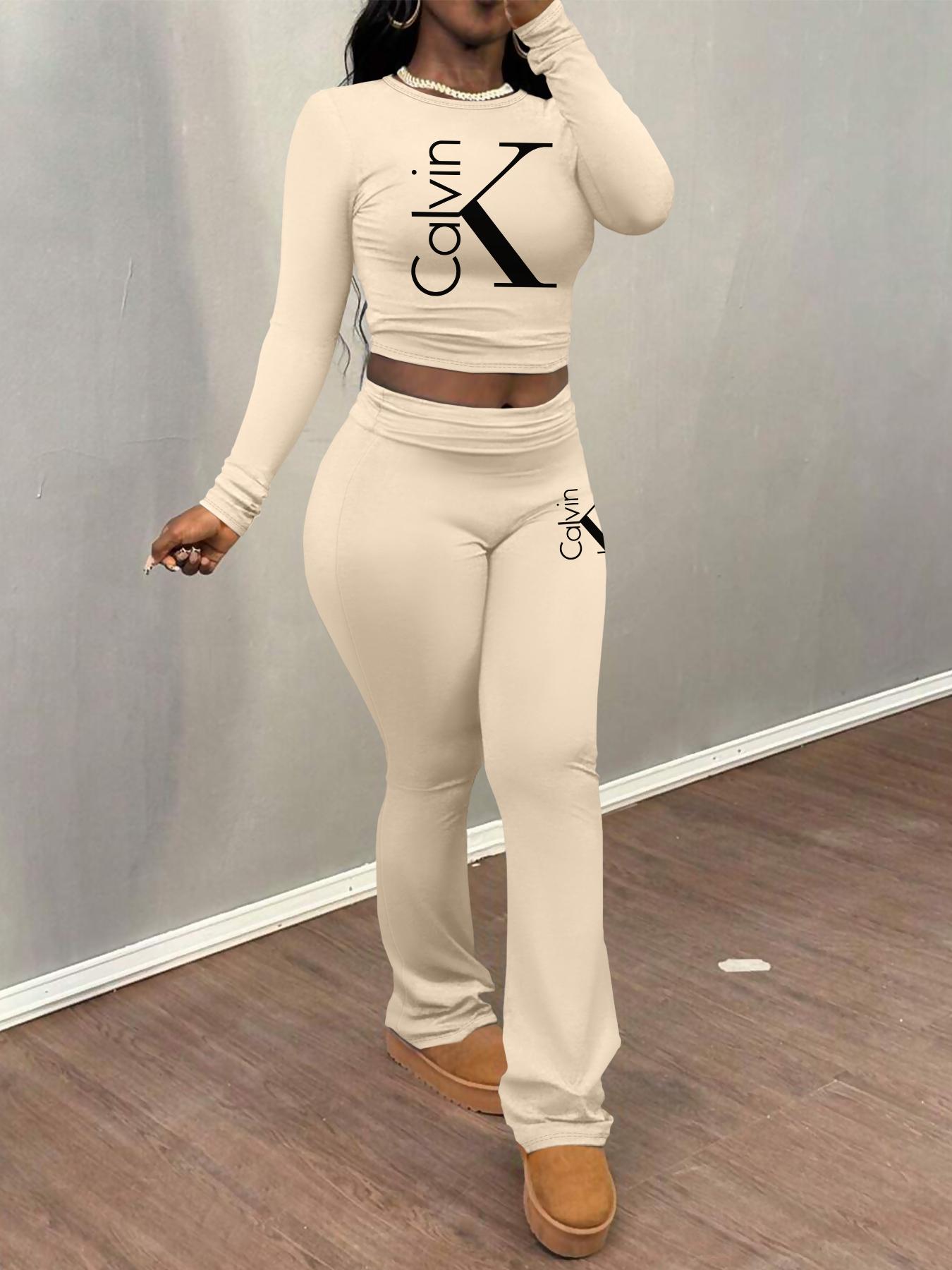Cakvin Letter printing Women's Letter Print Long Sleeve Crop Tee & Plain Flare Leg Pants Two-Piece Set, Casual Fashion Cozy Round Neck Top & Bell Bottom Trousers for Daily Outdoor Wear, Women's Clothing for Fall & Winter