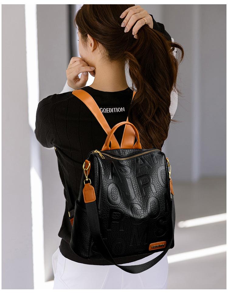 Embossed large-letter backpack, 2026 popular color-blocking multi-functional travel backpack, textured soft leather school bag for female students