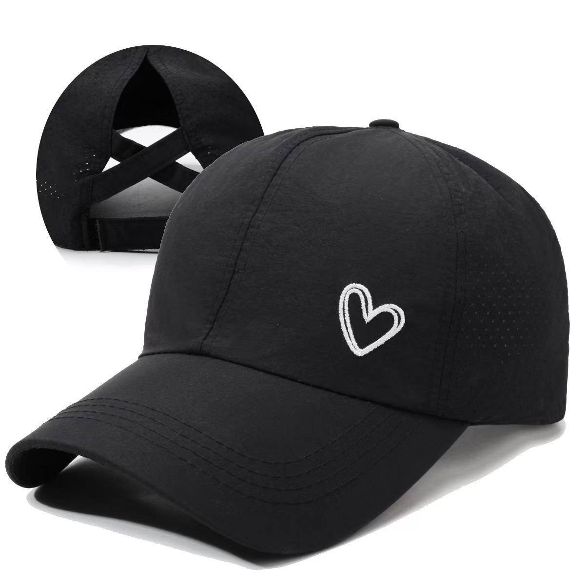 A Solid-color Heart-shaped Baseball Cap with an Adjustable Snapback Strap, Designed to Be Worn with a High Ponytail Tied Across the Back. Features a Breathable Mesh Panel at the Back. Available in White/black/gray/rose Red. Suitable for Golf, Cotton,summe