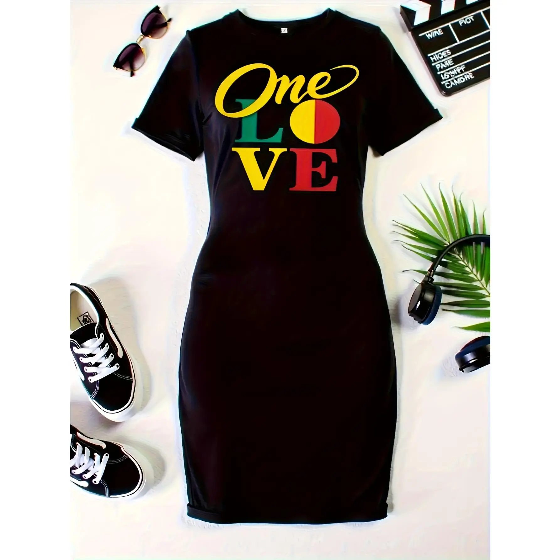 A Long Black Dress for Women Made from a Stretchy Mix, Featuring a Casual Beach Style with a Vibrant 'One Love' Print in Yellow, Green, And Red. Suitable for Both Parties And Everyday Wear, And Can Be Machine Washed