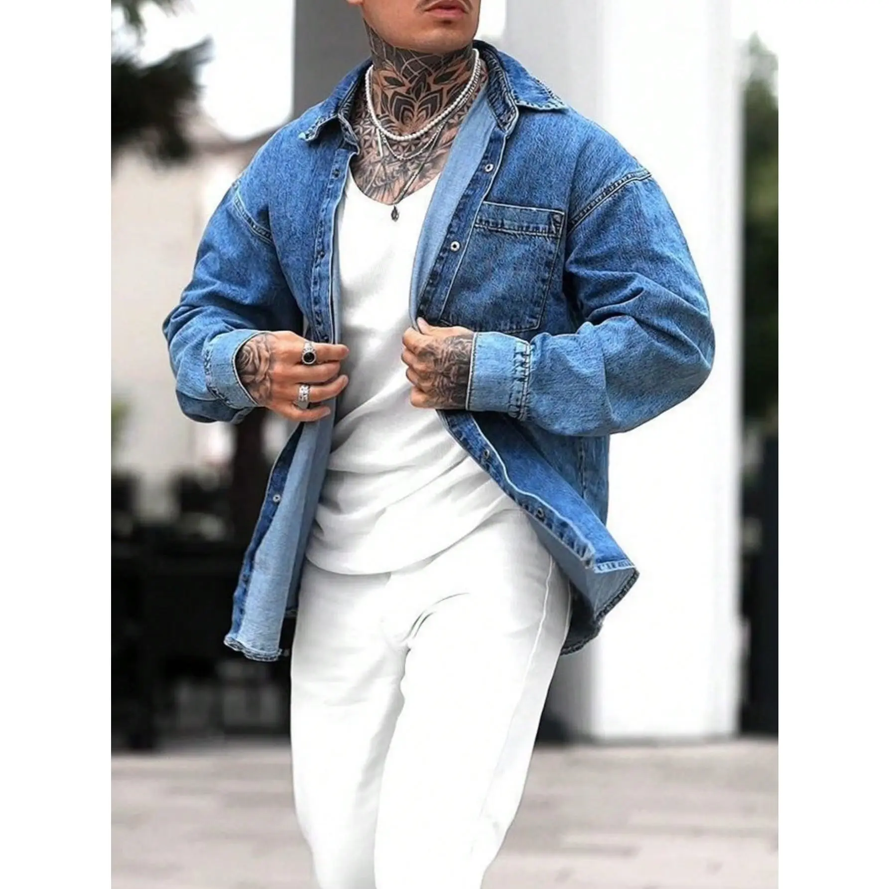 Cotton denim shirt jacket designed with classic lapel collar, chest patch pocket and button placket. Loose oversized fit offers excellent layering effects, creating fashionable street style looks for trendy mensfashion daily matching.