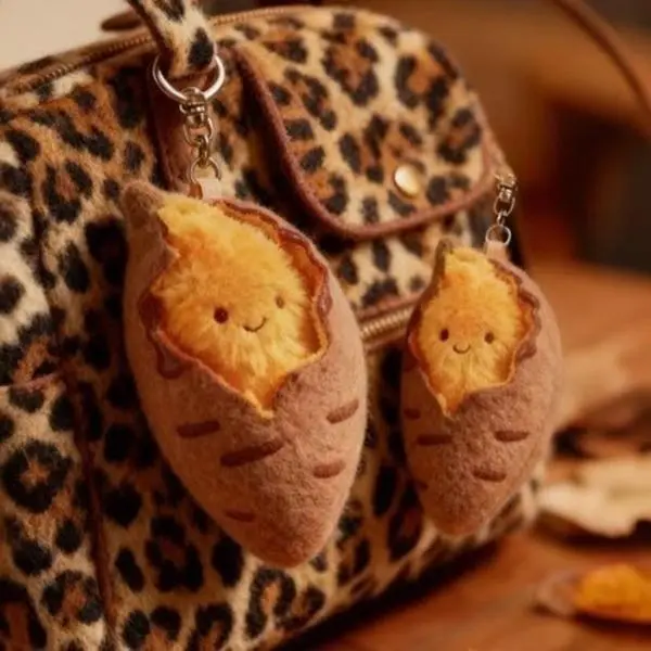 Popular internet-famous cute roasted sweet potato plush toy keychain bag charm, girly decoration, winter gift for children