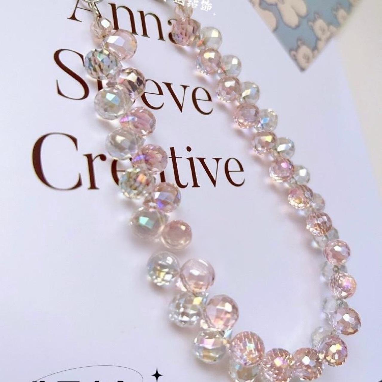 Luxurious, dazzling, high-end crystal water drop bead chain, strawberry crystal phone chain, bag accessory, keychain