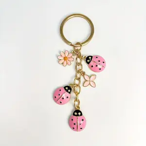 [Pink Hollow Ladybug] Pink Hollow Ladybug & Daisy Four-Leaf Clover Keychain - Golden Metal Fiber, Enchanting Charming, Perfect for Bags & Gifts Suitable for Men and Women