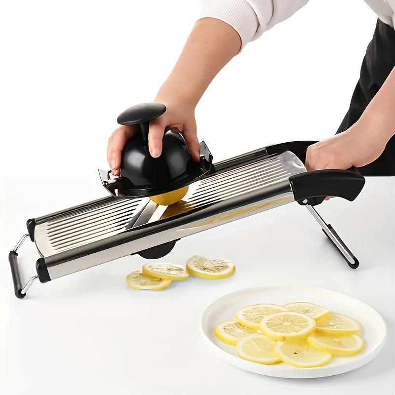 A Stainless Steel Vegetable And French Fry Slicer with Five Adjustable Blade Sizes, a Professional Mandoline Slicer, And an Onion Grater for Kitchen Additions