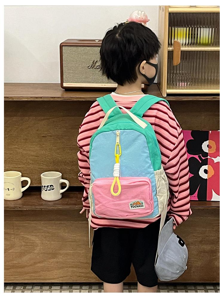Boys' and girls' backpack 2026 new fashion color-blocking kindergarten baby school bag large capacity children's backpack