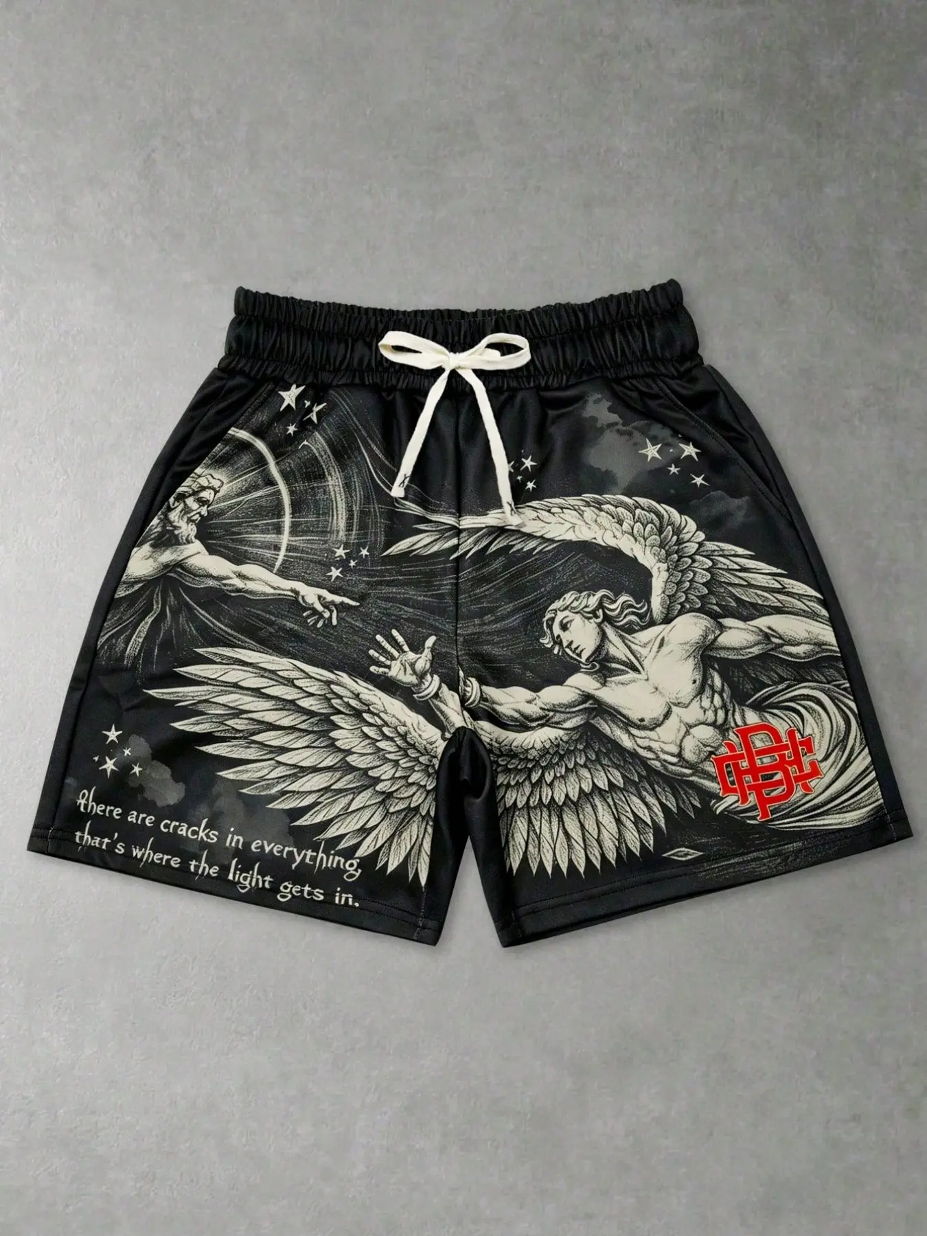 American hip-hop angel print men's shorts, unisex loose fit, trendy black shorts, retro wings, portrait, star pattern, creative letter print, graphic shorts, summer men's drawstring shorts, street style, Y2K style.