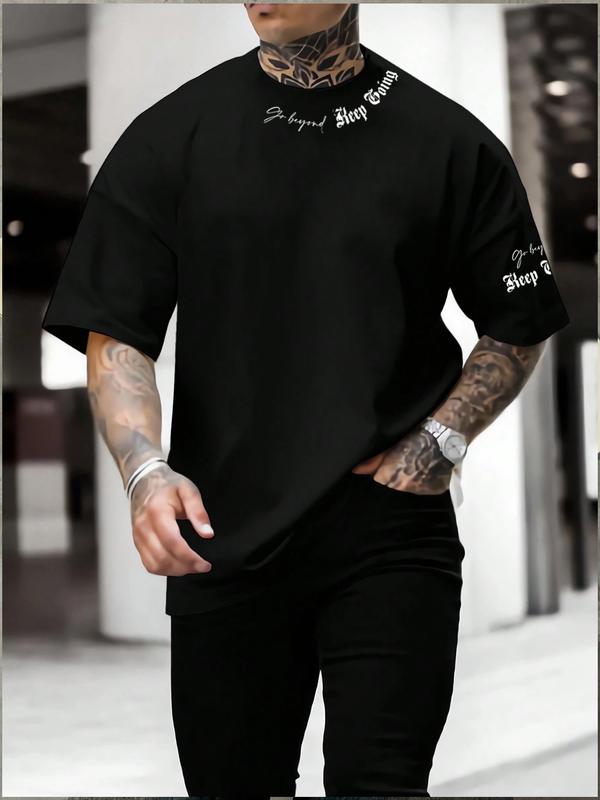 "Keep Going" Gym Pump Cover Oversized T-Shirt - Athletic Performance Tee with Script Detail on Sleeve & Neck, Hardcore Bodybuilding Streetwear for Workout Motivation and Summer Lifestyle.