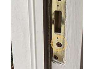 Stripped screw in door hardware