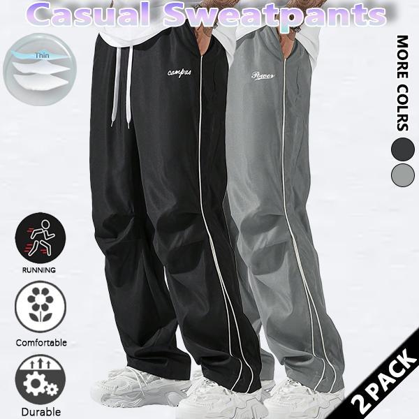 Loose-fitting sweatpants for men, grey side stripes with gold accent stripes, comfortable design, sports casual style bottoms, sweatpants, fitness wear, today's fashion outfit