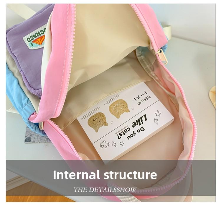 Boys' and girls' backpack 2026 new fashion color-blocking kindergarten baby school bag large capacity children's backpack