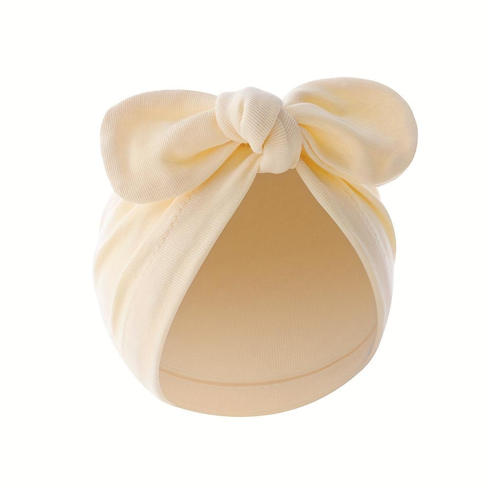 A Set of Three Soft Hats Newborns, Including a Knotted And Multi-Colored Cotton Bath Hats Infants